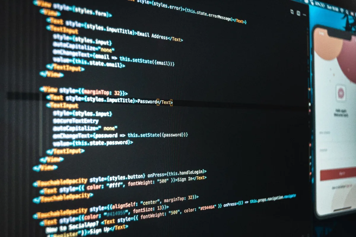 Code editor and app preview on a developer screen during website work