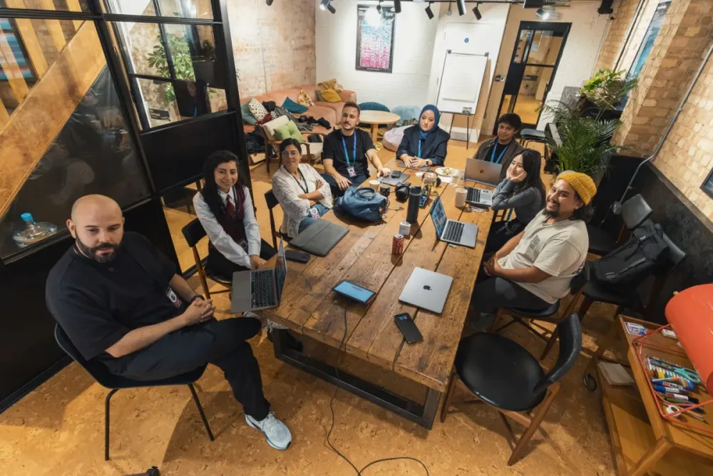 Diverse team collaborating in a modern workspace